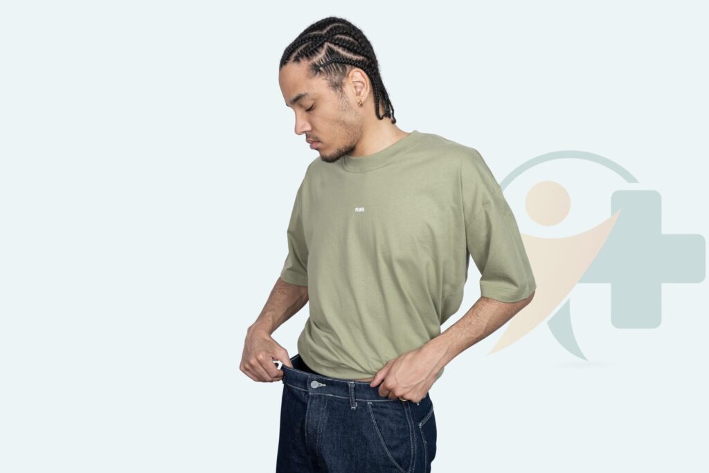 Jovem olhando para baixo e ajustando a calça como referência visual para gonorreia